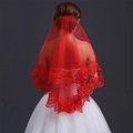 Elegant red two-layer bridal veil with intricate lace embroidery edges shown on model - Red