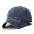 Detail view of washed navy cotton baseball cap with six-panel design and curved brim - Adjustable / Navy Blue