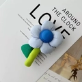 Blue knitted flower handbag with green checkered leaves and artisanal fabric texture - Accessory Small Blue Flower