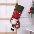 Knitted Christmas stocking with green plaid trim and a 3D forest gnome doll ornament - Cartoon Long-Legged Red Hat Santa Claus