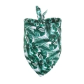 Detail showing tropical green leaf pattern and soft fabric texture of the pet bandana - Monstera Leaf