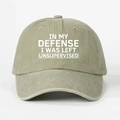 Macro detail of washed cotton baseball cap with white printed text on the front - Light Khaki