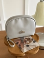 Mini light grey PU leather semi-circle makeup bag with wrist strap and metal plaque - Gray