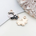 DIY black oil-drip enamel alloy cow pendant with golden textured back and top loop - Cow 18x16mm