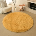 Soft yellow round shaggy rug made of plush silk wool for a modern living room - Ginger Yellow