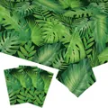 Detail of tropical palm and monstera leaf print fabric for jungle themed parties - Jungle Botanical Tablecloth