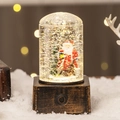 Weihnachts-Schneekugel Laterne mit Weihnachtsmann, Glitzer und rustikalem Holzsockel - Quadratische Box Weihnachtsmann und Baum