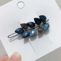 Eleganter Blatt-Haarclip mit dunkelblauen und grauen Kristallen auf silberner Basis - Blau Blatt Stil