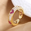 Adjustable gold open ring featuring three pink heart-shaped zircons and baguette stones - Gold