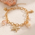 Bracciale dorato bohémien con stelle marine, perle bianche e conchiglie per donna - Bracciale a catena dorato con ciondoli a stella marina, perla artificiale e conchiglia