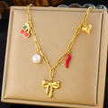 Detailed shot of gold necklace with cherry, heart, pearl, chili, and bow pendants - Cherry Heart Pearl Chili Bow Style (N3262)