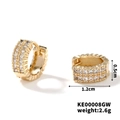 Detail view of 1.2cm gold huggie hoop earrings with micro-pave cubic zirconia stones - Gold