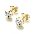 Detail view of bezel-set round zircon earrings with gold finish and butterfly backs - Round Bezel Set / Light Gold