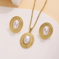 Close-up of gold textured necklace and earrings set with oval white pearls - Artificial Pearl Metal Frame Style (E3615-4)