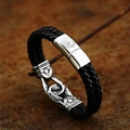 Close-up of black braided leather bracelet with Viking rune engraved silver metal clasp - 18cm / Double Rope Viking Clasp