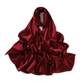 Detail of burgundy satin silk scarf showing smooth lustrous texture and premium drape - Ruby Red