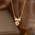 Goldene Schleifen-Halskette mit rosa Herzkristall und weißen Zirkonsteinen an Gliederkette - Rosa Zirkonia Herz Schleife Halskette (9130)