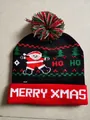 Christmas LED knit beanie featuring Santa Claus and Merry Xmas text with colorful pompoms - MERRY XMAS Lettering