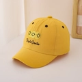 Close-up of Triple Smile embroidery on a yellow cotton baseball cap for kids - 48-52cm (2-6 Years) / Yellow