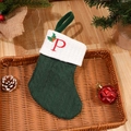 Dark green knitted Christmas stocking with red letter P embroidery and white cuff - Letter P