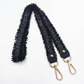 Detail of black tweed shoulder strap with fringe edges and golden metal swivel hooks - Handheld/Underarm Style / Black