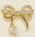 Golden bow pendant with micro-set zircons and a clear heart-shaped gemstone drop - Heart Drop Bowknot-ZTP0063
