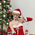 Sparkly gold 2025 party glasses paired with a festive red Christmas costume and hat - Gold Long 2025 Glasses
