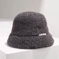 Detailed plush texture of dark grey faux fur bucket hat with white pearl accents - Gray