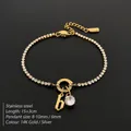 Elegant gold stainless steel tennis bracelet featuring letter b and clear rhinestone pendant - Gold / Letter B