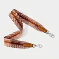 Close-up of a wide brown and white woven shoulder strap with silver swivel metal hooks - Standard Type / Brown Silver
