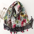 Colorful floral cotton linen scarf with black tassels on white background with magazine - Multicolor Floral Black Fringe (SL2409-007)