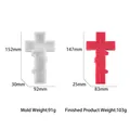 Detailed view of white silicone cross mold and red 'blessed' candle with weight specs - Large Text Relief Cross Mold