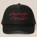 Detail of red American Made embroidery and stars on a black mesh trucker cap - All Black