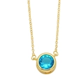 Macro view of gold chain with circular blue sapphire pendant in bezel setting - Light Blue