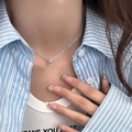 Minimalist silver chain necklace with cylindrical pendant worn by a female model - Minimalist Cylinder Style (XL2806)