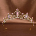 Detail shot of golden bridal crown featuring pink marquise rhinestones and crystals - Vintage Pink