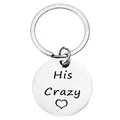 Detail view of round stainless steel keychain with His Crazy engraving and heart icon - His Crazy / 25mm