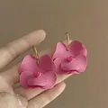 Detail of pink floral earrings with frosted layered petals and gold metal hooks - 14# Ear Hook - Pink