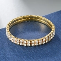 Detailed macro shot of double-row elastic bracelet with four-prong set sparkling crystals - 2 Rows / Gold