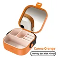 Portable Canna Orange jewelry box with built-in mirror and ring slots for storage - Jewelry Box with Mirror (TPE) / Canna Orange