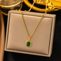 Vintage emerald pendant necklace with gold chain displayed on a luxury jewelry box - XLH6117 Bezel Set Emerald Necklace Gold