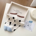 Damen-Söckchen in Creme mit schwarzen Punkten und Textur aus Noppengarn - Punkt