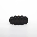 Cloud-shaped black acrylic clutch bag with wave structure and gold metal clasp - Black