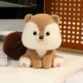 Cute stuffed squirrel plush toy with big fluffy tail and soft brown fur on office desk - Beaver Sitting Style