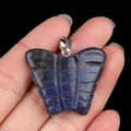 Lapis lazuli butterfly pendant with natural blue mineral texture and silver bail - Blue Sodalite