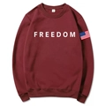 Unisex wine red sweatshirt with Freedom print and flag detail on sleeve in size M - Burgundy