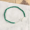 Natural green stone beaded bracelet featuring a silver cross pendant on a linen surface - Silver Plated Dark Green