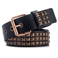 Close-up of punk style black leather belt featuring triple row of bronze pyramid studs - Red Bronze