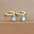 Detailed macro view of S925 silver water drop earrings with turquoise pavé accents - Gold Blue Zirconia
