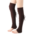 Close-up of dark brown knit leg warmers featuring retro cable pattern and lace-up ribbons - One Size / Coffee